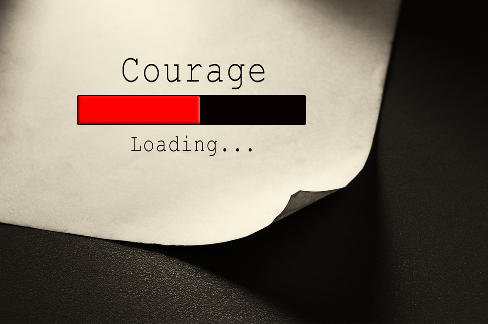 Photo of a loading bar with the word courage