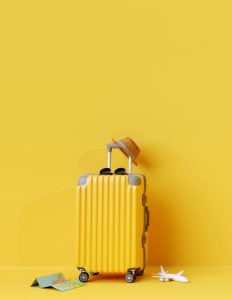 Photo of a bright yellow suitcase