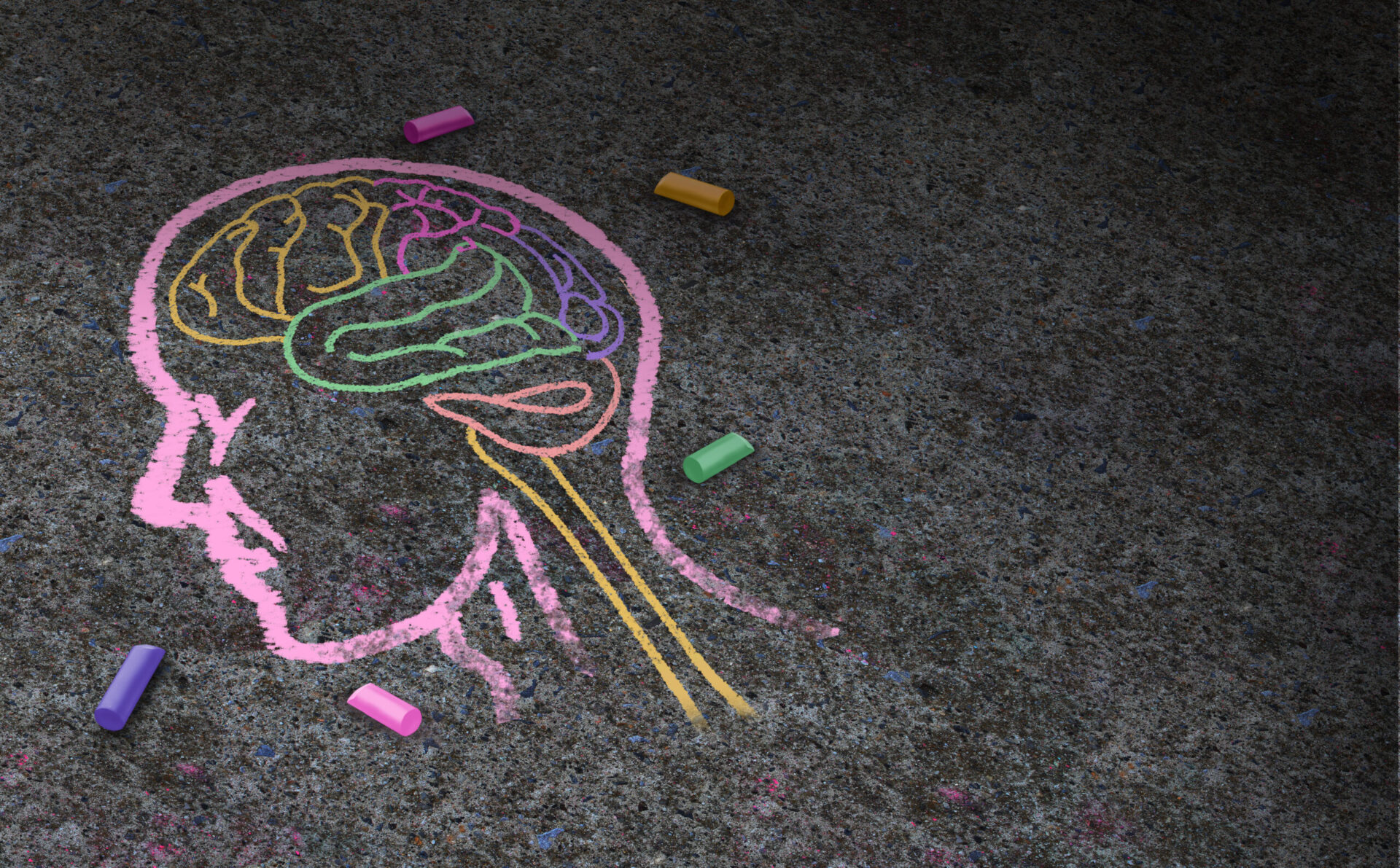 Photo of a colourful chalk drawing of the human mind
