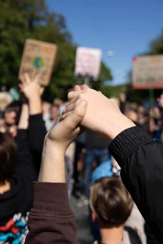 Photo of two people in a protest