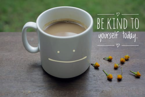 Photo of a mug and 'Be kind to yourself today' next to it