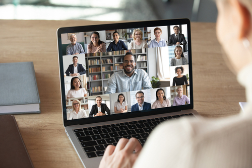 Photo of a team having a virtual meeting on a laptop