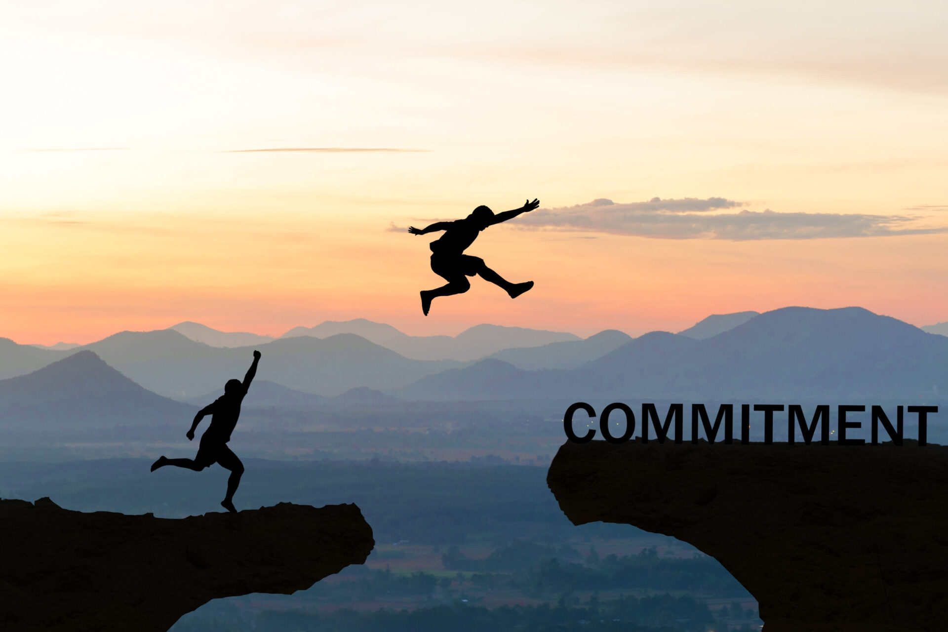 Photo of people jumping to 'commitment'