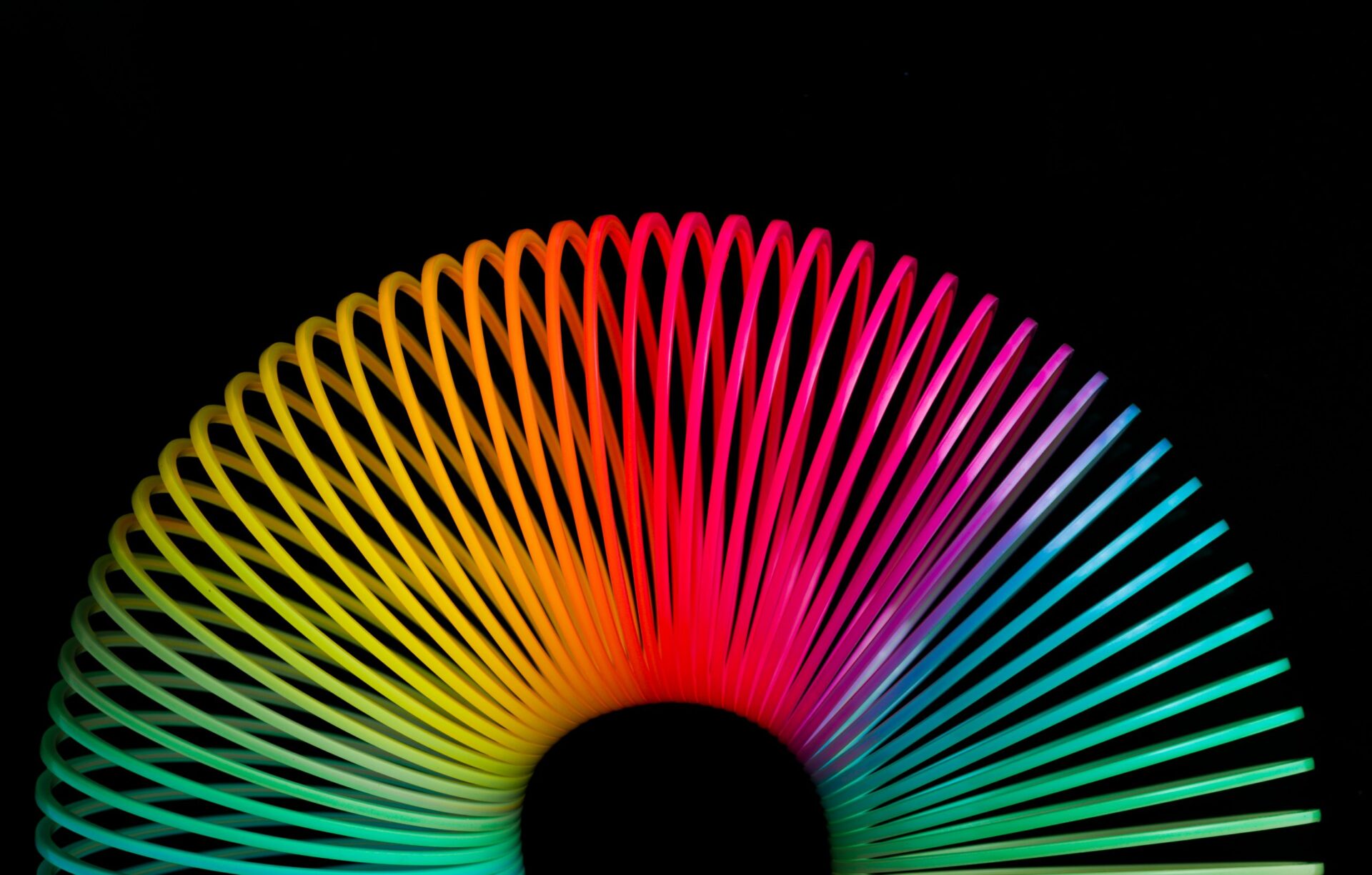 Photo of a multi-coloured slinky toy