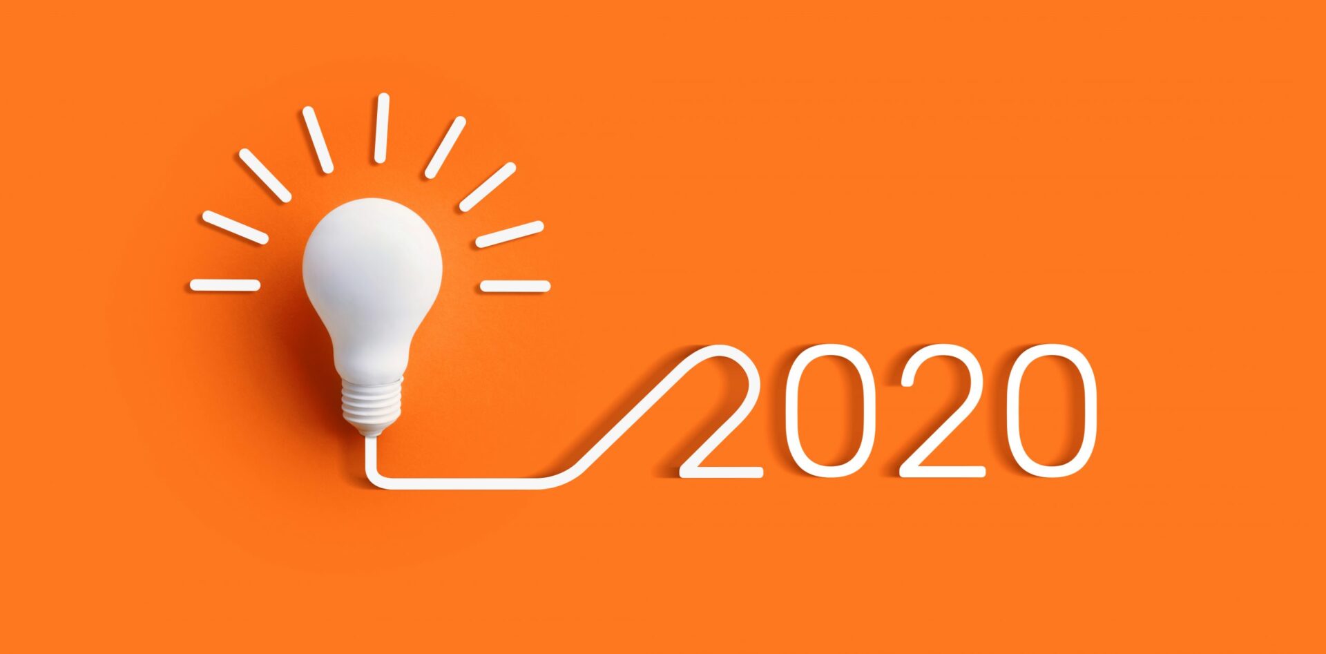Photo of 2020 and a light bulb beside it